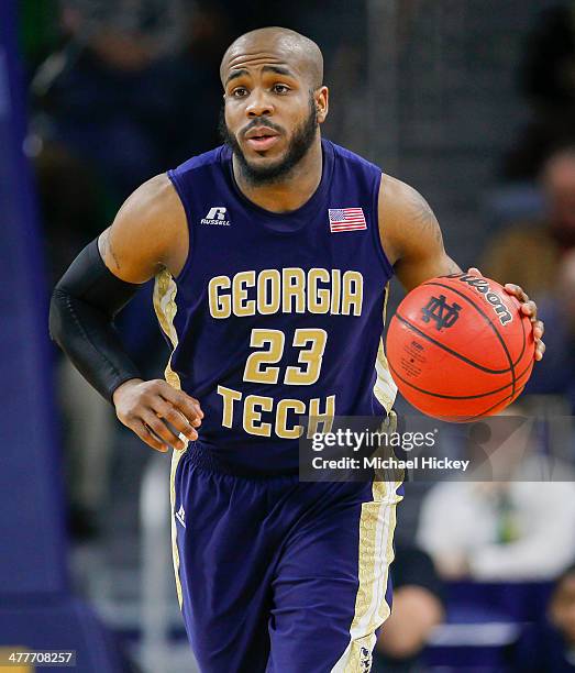 Trae Golden of the Georgia Tech Yellow Jackets brings the ball up court during the game against the Notre Dame Fighting Irish at Purcel Pavilion on...