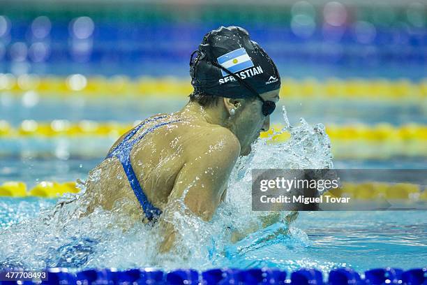 Julia Cebastian of Argentina competes in womens 100m breaststroke final event during day four of the X South American Games Santiago 2014 at Centro...