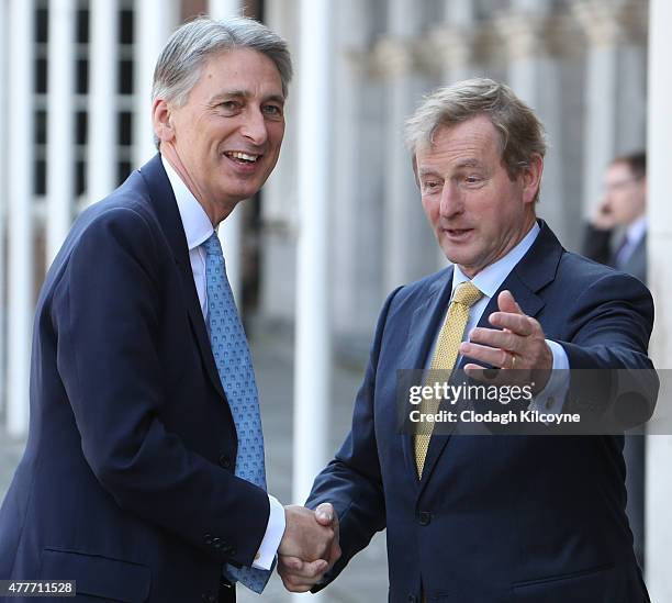British Foreign Secretary, Philip Hammond MP greets Irish Taoiseach Enda Kenny at the 24th British-Irish Council Summit at Dublin Castle on June 19,...