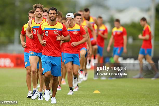 Karmichael Hunt runs during a Gold Coast Suns AFL training session at Metricon Stadium on March 11, 2014 in Gold Coast, Australia.