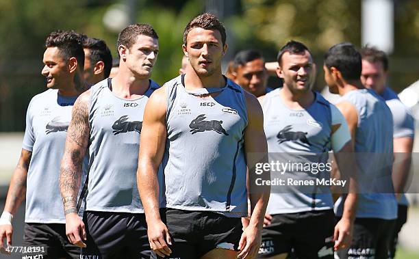 John Sutton, Luke Burgess, Sam Burgess and Beau Champion arrive at the South Sydney Rabbitohs NRL training session at Redfern Oval on March 11, 2014...