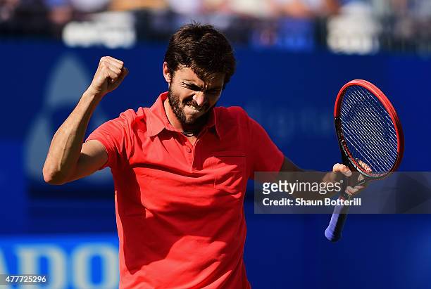 Gilles Simon of France celebrates victory in his men's singles quarter-final match against Milos Raonic of Canada during day five of the Aegon...