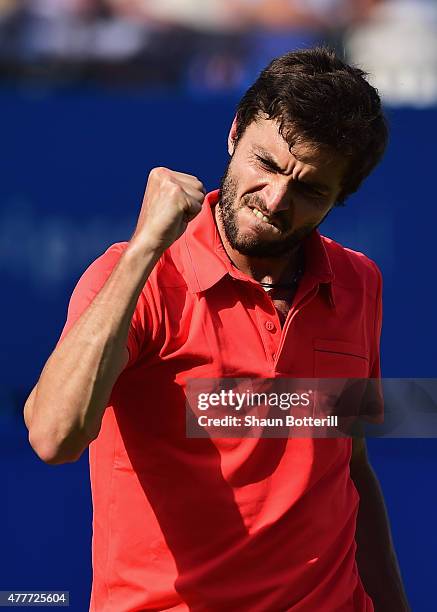 Gilles Simon of France celebrates victory in his men's singles quarter-final match against Milos Raonic of Canada during day five of the Aegon...