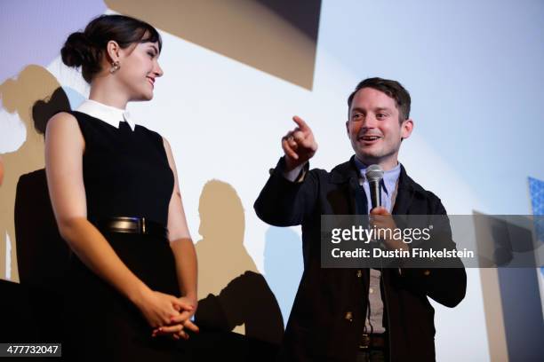 Actors Sasha Grey and Elijah Wood speak onstage at the "Open Windows" Photo Op and Q&A during the 2014 SXSW Music, Film + Interactive Festival at...