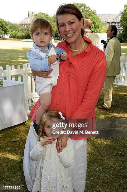 Kate Silverton, her son Wilbur and daughter Clemency attend the Flannels for Heroes charity cricket match and garden party hosted by menswear brand...