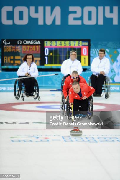 Bob McPherson of Great Britain competes in the Round Robin Session 7 during day four of Sochi 2014 Paralympic Winter Games at Ice Cube Curling Center...