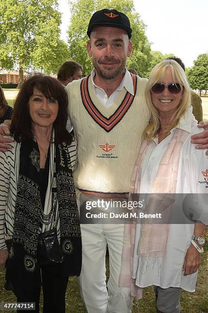 Joe Sims , Susan George and guest attend the Flannels for Heroes charity cricket match and garden party hosted by menswear brand Dockers at Burton's...