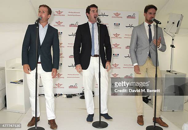 Humphrey Berney, Ollie Baines and Stephen Bowman perform during the Flannels for Heroes charity cricket match and garden party hosted by menswear...