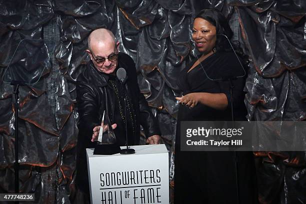 Bernie Taupin and Jacqueline Dixon speak during the Songwriters Hall Of Fame 46th Annual Induction And Awards at Marriott Marquis Hotel on June 18,...