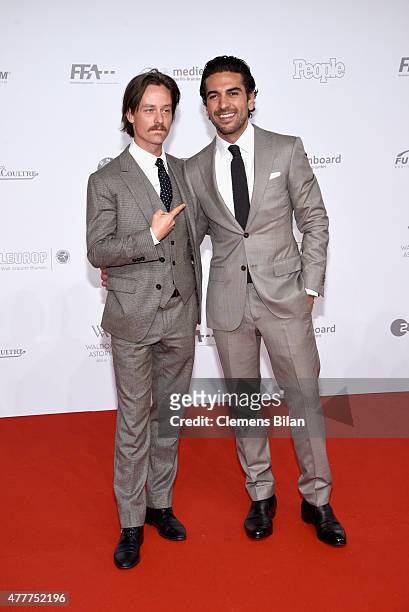 Tom Schilling and Elyas M'Barek arrive for the German Film Award 2015 Lola at Messe Berlin on June 19, 2015 in Berlin, Germany.