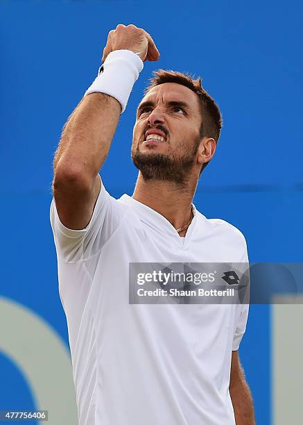 Viktor Troicki of Serbia celebrates victory in his men's singles quarter-final match against John Isner of USA during day five of the Aegon...