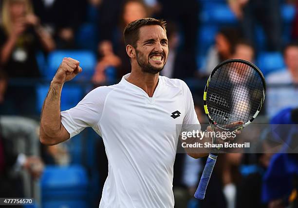 Viktor Troicki of Serbia celebrates victory in his men's singles quarter-final match against John Isner of USA during day five of the Aegon...