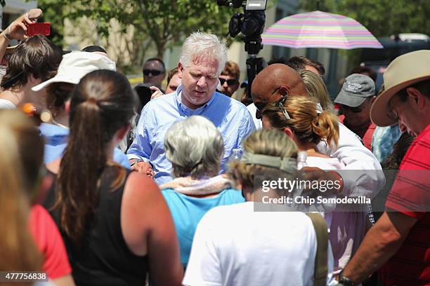 Conservative television and radio personality Glenn Beck leads a crowd in prayer outside the historic Emanuel African Methodist Episcopal Church...