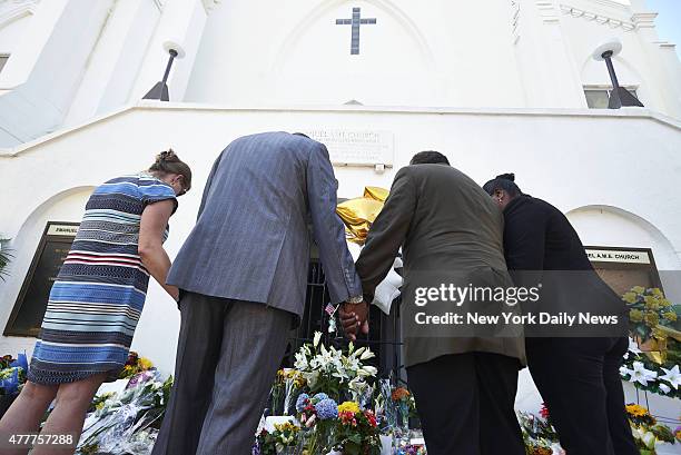 Shooting at The Emanuel African Methodist Episcopal Church Charleston, S.C. People gather at a memorial in front of church on Thursday, June 18, 2015...