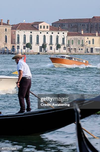 First Lady Michelle Obama and her daughters sit on the back of a Police boat leading to the Doge Palace on June 19, 2015 in Venice, Italy. Michelle...