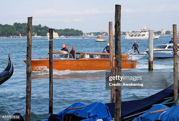 First Lady Michelle Obama and her daughters sit on the back of a Police boat leading to the Doge Palace on June 19, 2015 in Venice, Italy. Michelle...