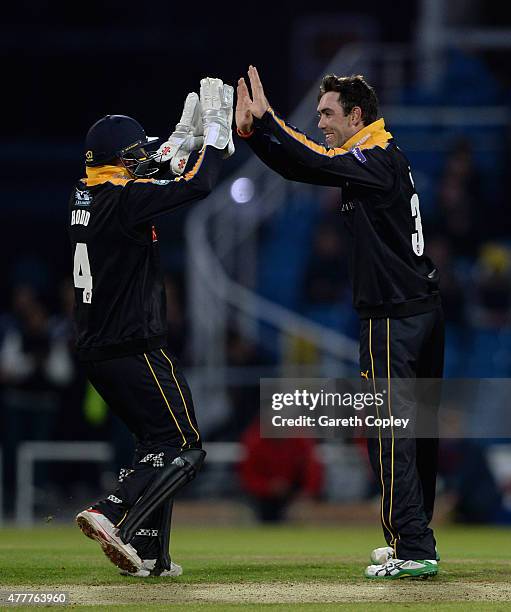 Glenn Maxwell of Yorkshire celebrates with Andy Hodd after dismissing Steven Mullaney of Nottinghamshire during the NatWest T20 Blast match between...
