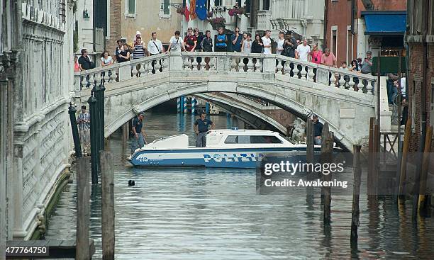 Police block a canal and divers inspect it ahead of the arrival to Saint Mark's Cathedral of First Lady Michelle Obama and her daughters on June 19,...