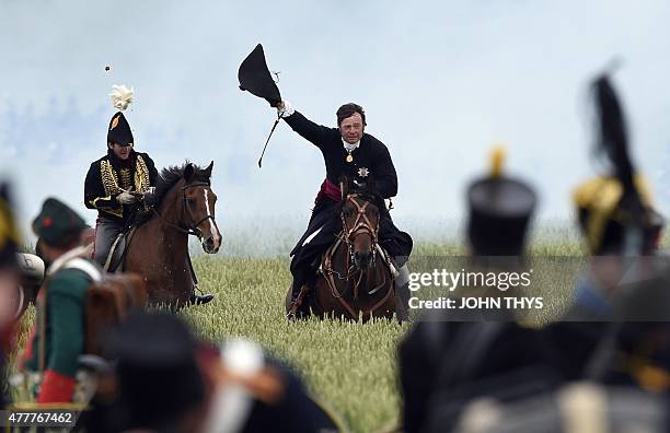 Alan Larsen , a historical events consultant from New Zealand playing the role of The Duke of Wellington, takes part in a reenactment of the Battle...