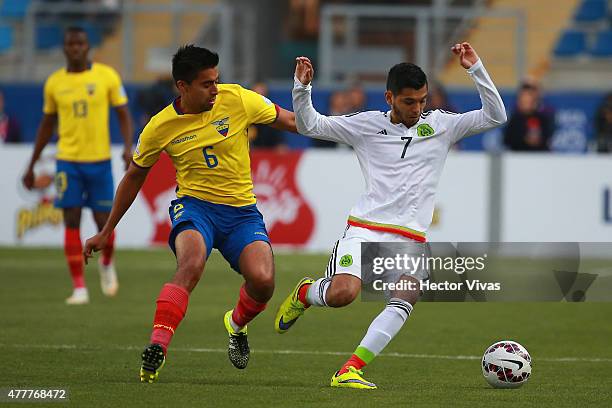 Jesus Corona Ruiz of Mexico fights for the ball with Christian Noboa of Ecuador during the 2015 Copa America Chile Group A match between Mexico and...