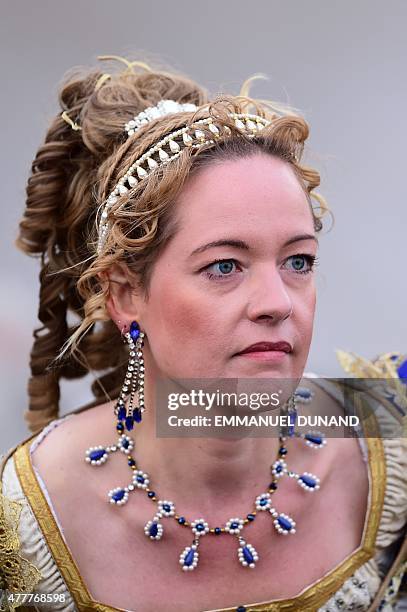 Woman dressed up as an aristocrate take part in the re-enactement of the Battle of Waterloo, during the celebrations of the 200th anniversary of The...