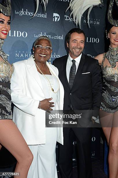 Firmine Richard and Bernard Montiel attends Les Globes de Cristal 2014 Awards Ceremony at Le Lido on March 10, 2014 in Paris, France.