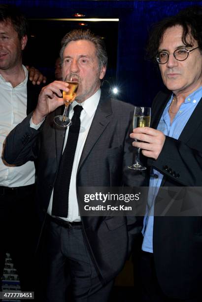 Daniel Auteuil and writer Eric Assous attend Les Globes de Cristal 2014 Awards Ceremony at Le Lido on March 10, 2014 in Paris, France.