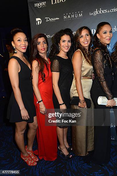 Sarah Kiss , Sabrina Ouazani and members of Unissons nos Voix band attend Les Globes de Cristal 2014 Awards Ceremony at Le Lido on March 10, 2014 in...