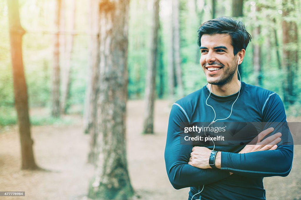 Portrait of young man with sports clothes