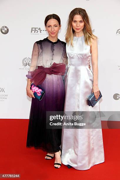 Katharina Schuettler and Nora von Waldstaetten arrive to the German Film Award 2015 Lola at Messe Berlin on June 19, 2015 in Berlin, Germany.