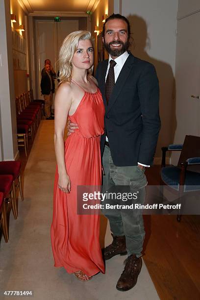 Singer HollySiz alias Cecile Cassel and John Nollet attend French minister of Culture and Communication Fleur Pellerin gives Medal of 'Knight of Arts...