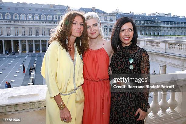 Singer HollySiz alias Cecile Cassel standing between Sylvie Hoarau and Aurelie Saada attend French minister of Culture and Communication Fleur...