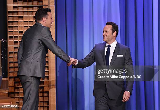 Jimmy Fallon shakes hands with actor Vince Vaughn as he visits "The Tonight Show Starring Jimmy Fallon"at Rockefeller Center on June 19, 2015 in New...