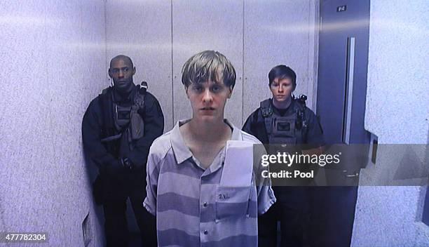 In this image from the video uplink from the detention center to the courtroom, Dylann Roof appears at Centralized Bond Hearing Court June 19, 2015...