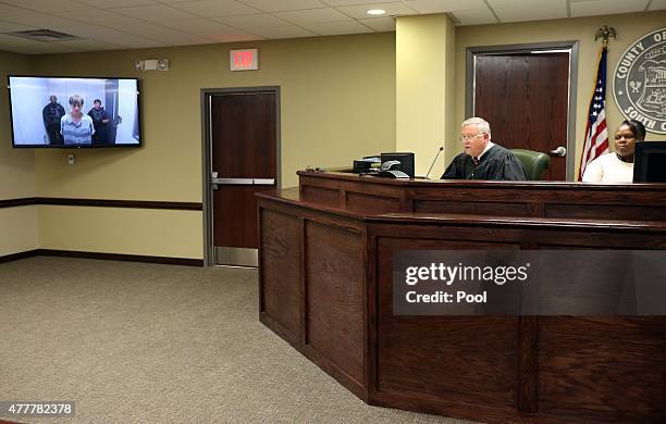 Judge James Gosnell speaks as Dylann Roof appears via video uplink from the detention center to the courtroom at Centralized Bond Hearing Court June...