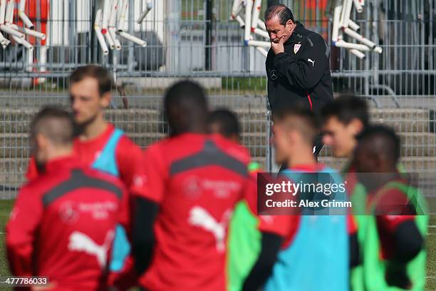 Head coach Huub Stevens looks on during a VfB Stuttgart training session at the club's training ground on March 11, 2014 in Stuttgart, Germany.