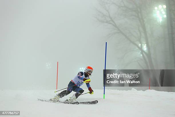 Mark Bathum of United States competes in the Men's SC Slalom Run 1, Visually Impaired during day four of Sochi 2014 Paralympic Winter Games at Rosa...