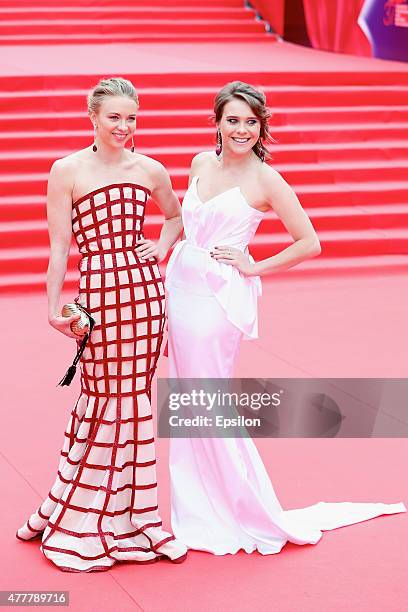 Anzhelika Timaninab and Dariya Tinbush attend the opening ceremony of the Moscow International Film Festival at Pushkinsky Cinema on June 19, 2015 in...