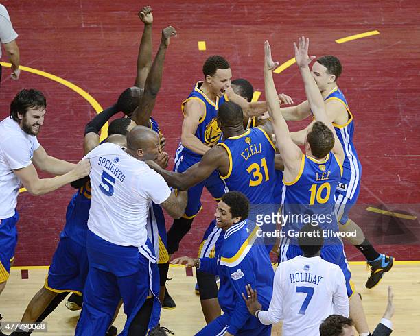 The Golden State Warriors celebrate winning the Larry O'Brein Trophy after Game Six of the 2015 NBA Finals against the Cleveland Cavaliers at The...