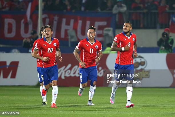 Charles Aranguiz of Chile celebrates after scoring the opening goal during the 2015 Copa America Chile Group A match between Chile and Bolivia at...