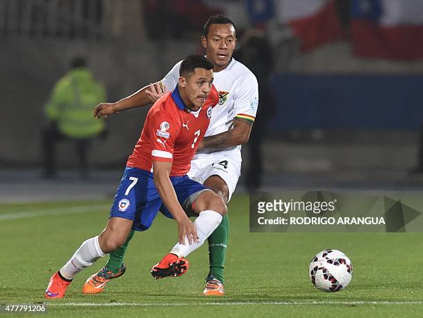 Chile's forward Alexis Sanchez and Bolivia's defender Edemir Rodriguez vie during their 2015 Copa America football championship match against...