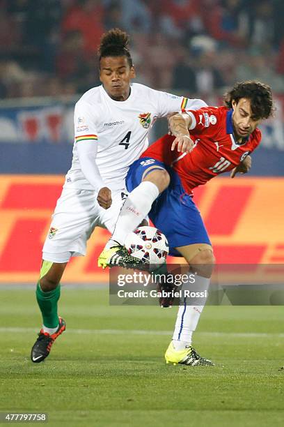 Jorge Valdivia of Chile fights for the ball with Alejandro Pinedo of Bolivia during the 2015 Copa America Chile Group A match between Chile and...