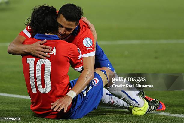 Alexis Sanchez of Chile celebrates with teammate Jorge Valdivia after scoring the second goal of his team during the 2015 Copa America Chile Group A...