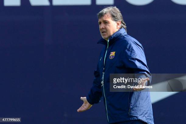 Head coach Gerardo 'Tata' Martino of FC Barcelona reacts during a training session ahead the UEFA Champions League Round of 16 second Leg match...