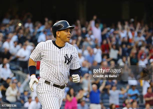 Alex Rodriguez of the New York Yankees hits a home run as well as getting his 3000th career hit in the first inning against Justin Verlander of the...