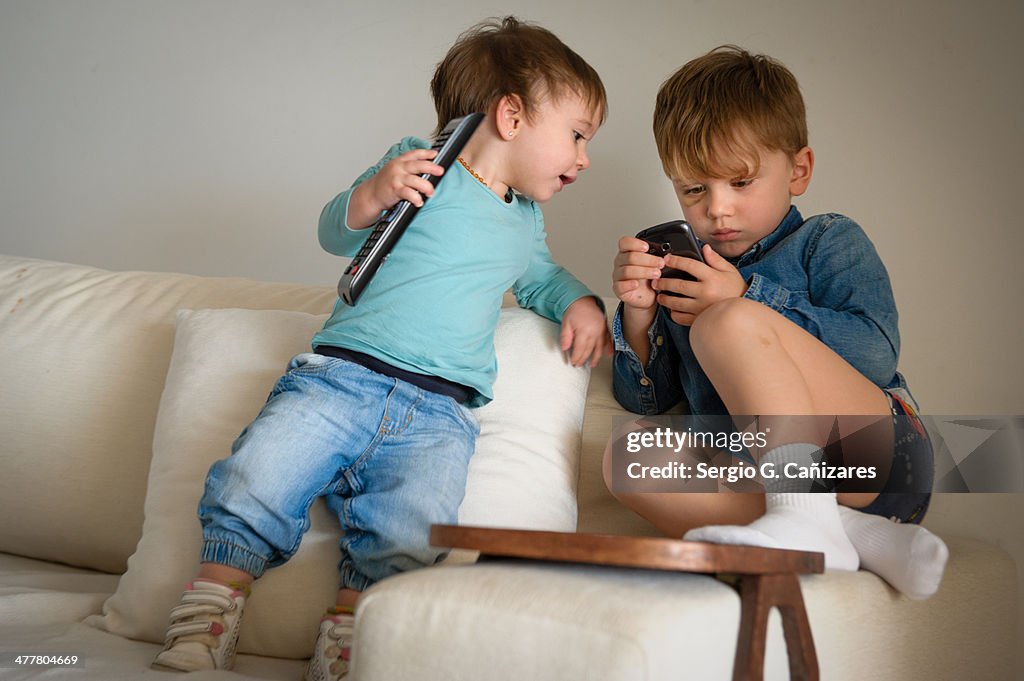 Playing Using Phone Playing Smartphone High-Res Stock Photo - Getty Images