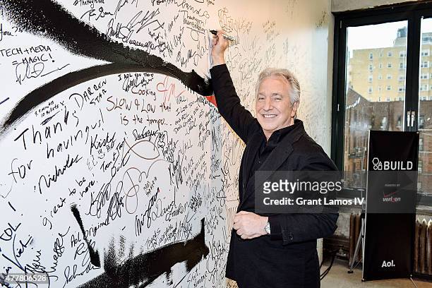 Actor Alan Rickman signs the wall at the AOL Build Speaker Series at AOL Studios In New York on June 19, 2015 in New York City.