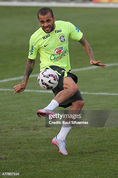 Dani Alves of Brazil controls the ball during a training session at Azul Azul training camp on June 19, 2015 in Santiago, Chile. Brazil will face...