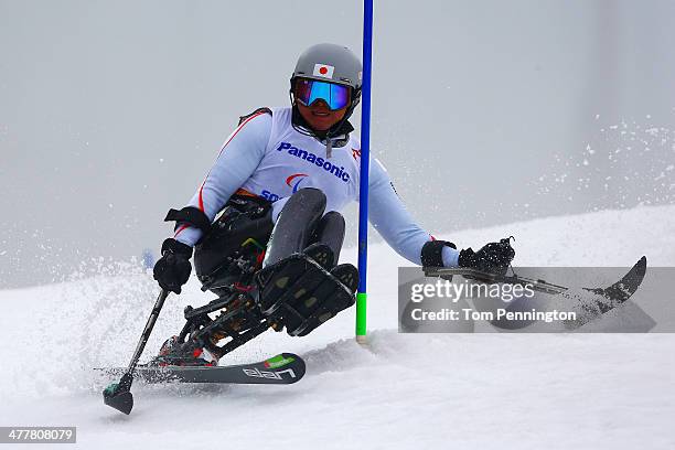 Taiki Morii of Japan competes in the Men's SC Slalom Run 1, Sitting during day four of Sochi 2014 Paralympic Winter Games at Rosa Khutor Alpine...