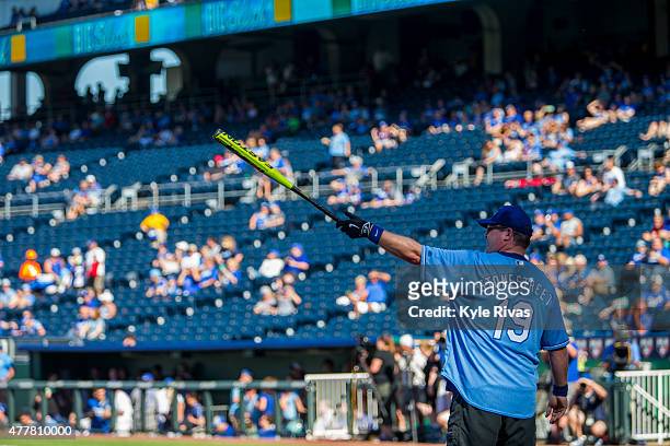 Eric Stonestreet points to the outfield before his at-bat during the celebrity softball game for the Big Slick Celebrity Weekend benefiting...